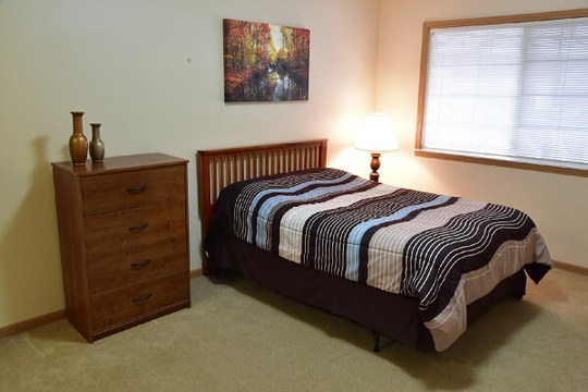 Apartment Bedroom with a single bed